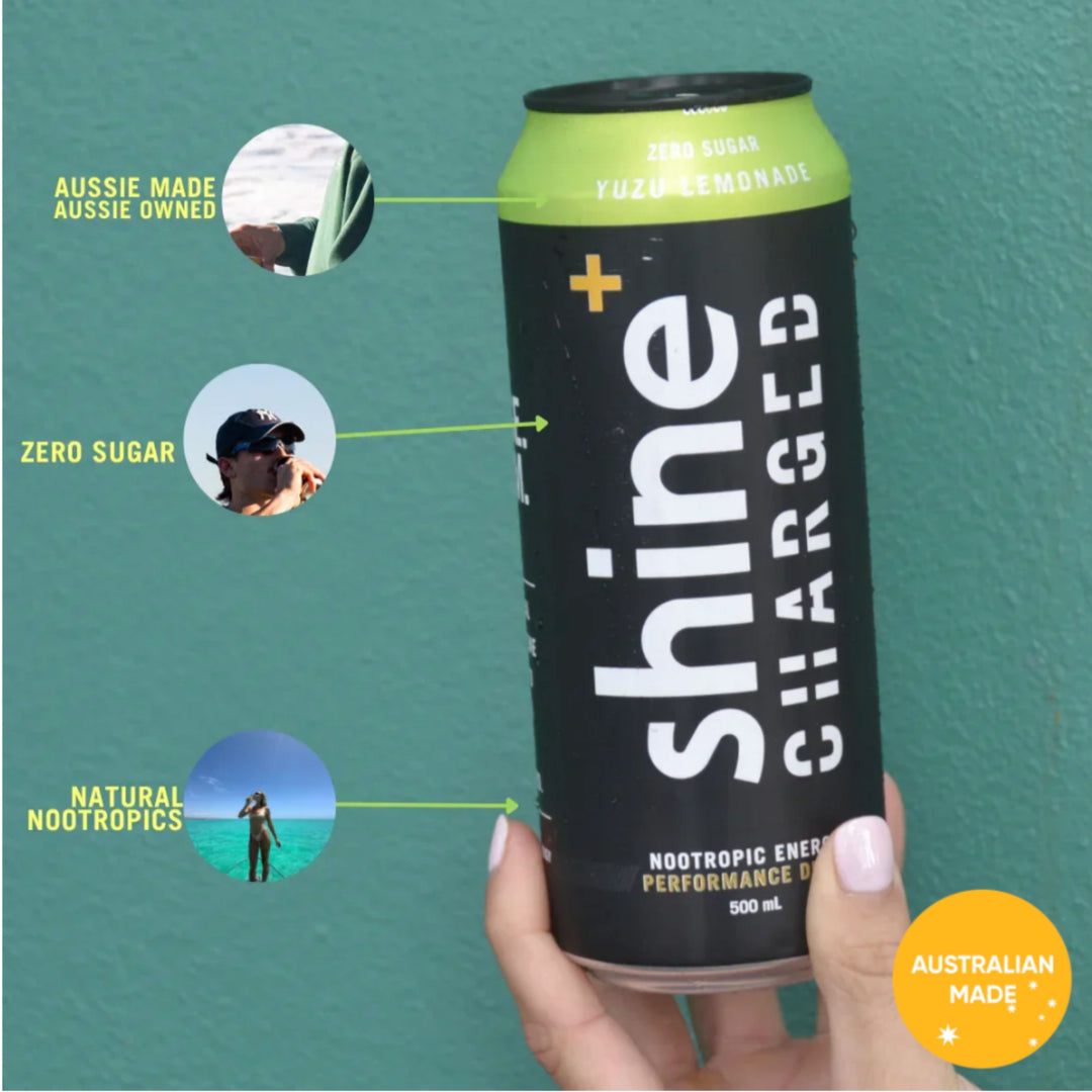 Hand holding Shine+ Charged nootropic energy drink can, yuzu lemonade flavor, zero sugar, Australian made, natural nootropics