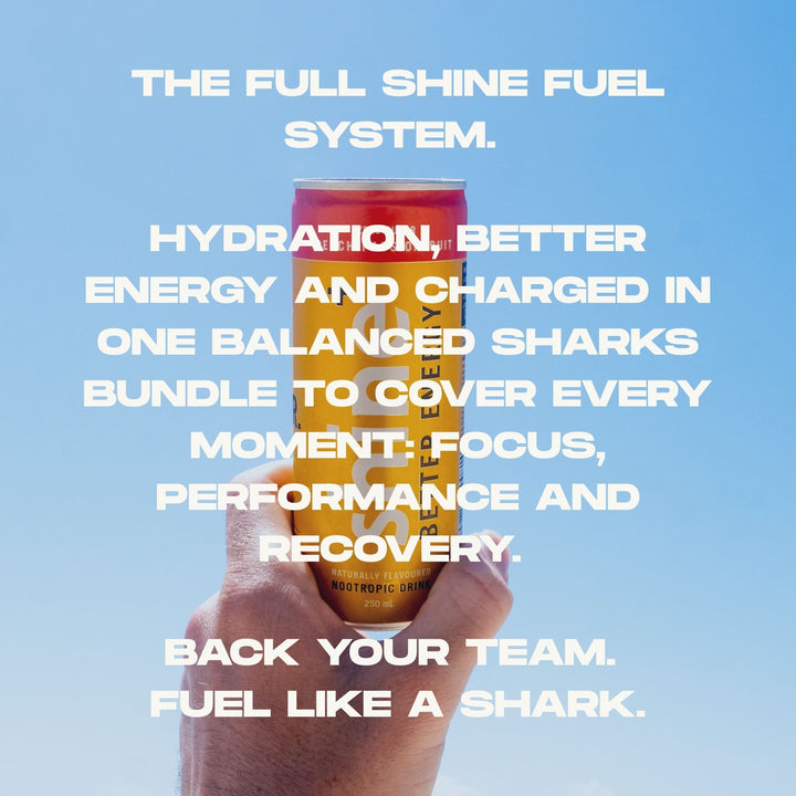 Hand holding a yellow can of nootropic drink against clear sky with promotional text overlay