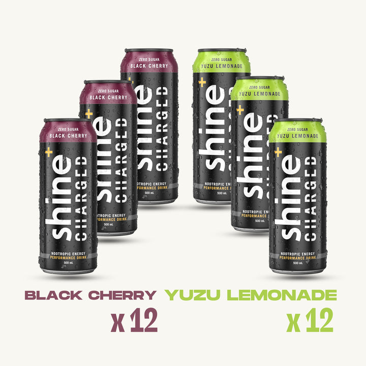 Six cans of Shine Charged nootropic energy drink in Black Cherry and Yuzu Lemonade flavors