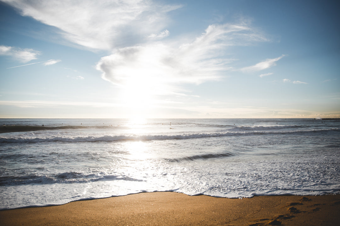 sunrise-over-barcelona-beach - Shine+ Drink